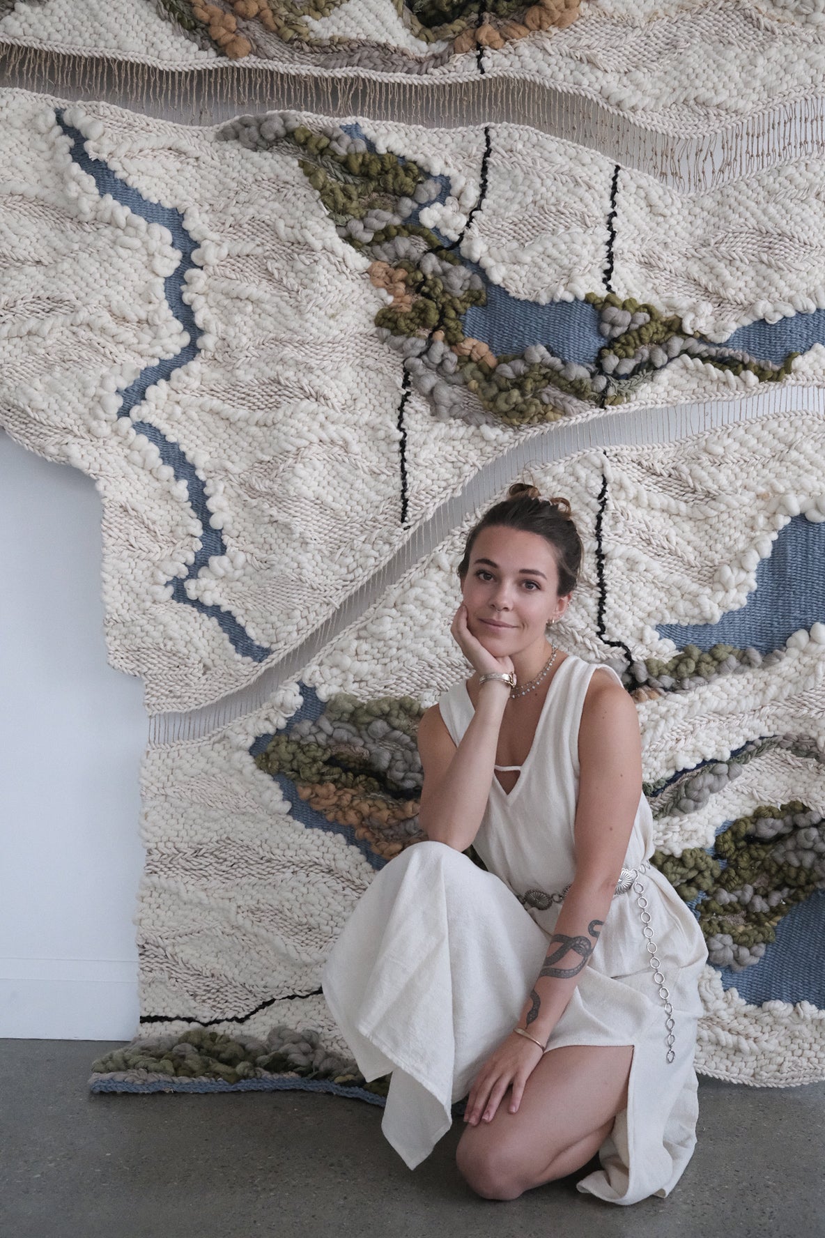 Large-scale woven tapestry handcrafted with wool, cotton, and natural fibers. Contemporary fiber art with layered textures and abstract patterns for modern interiors and collectors.