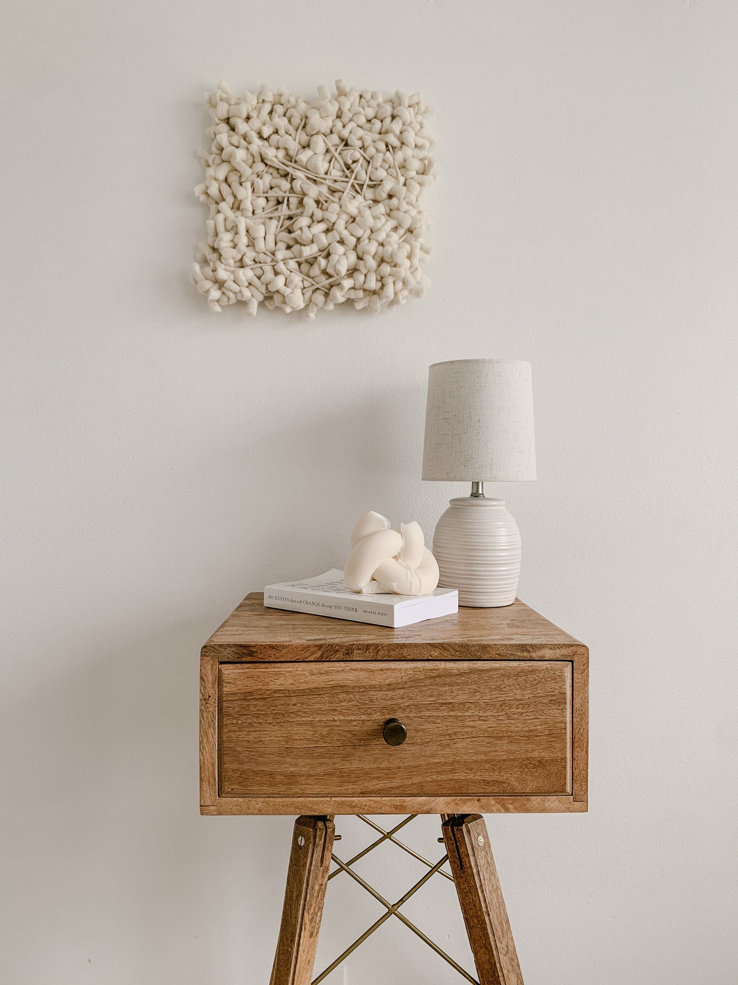 Contemporary fiber expression made with eco-conscious materials and intuitive patterning.
Simple wall piece.