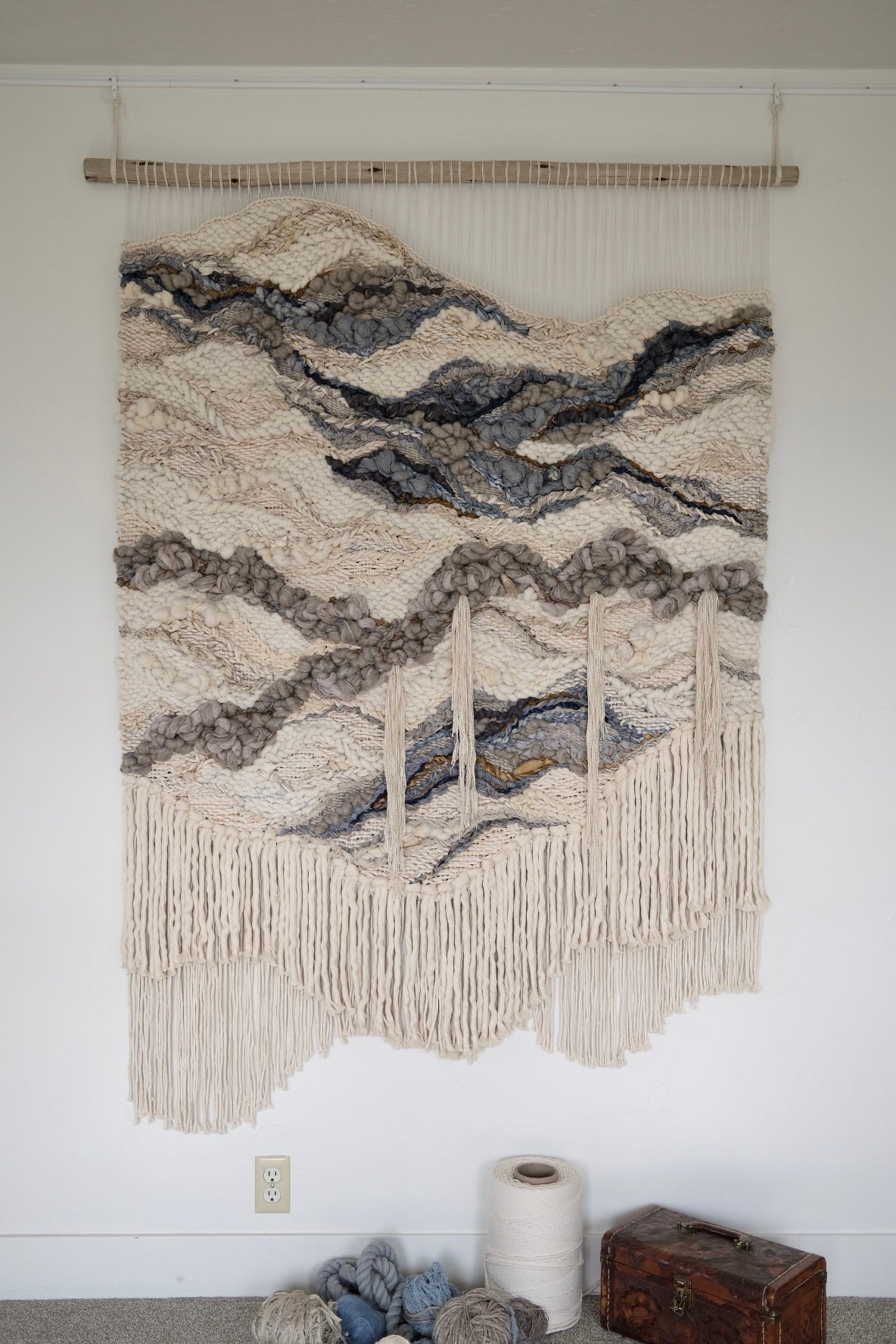 Finished woven tapestry by Rebecca Whitaker, made using traditional handweaving techniques and natural materials.