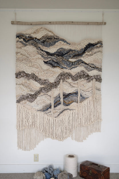 Finished woven tapestry by Rebecca Whitaker, made using traditional handweaving techniques and natural materials.