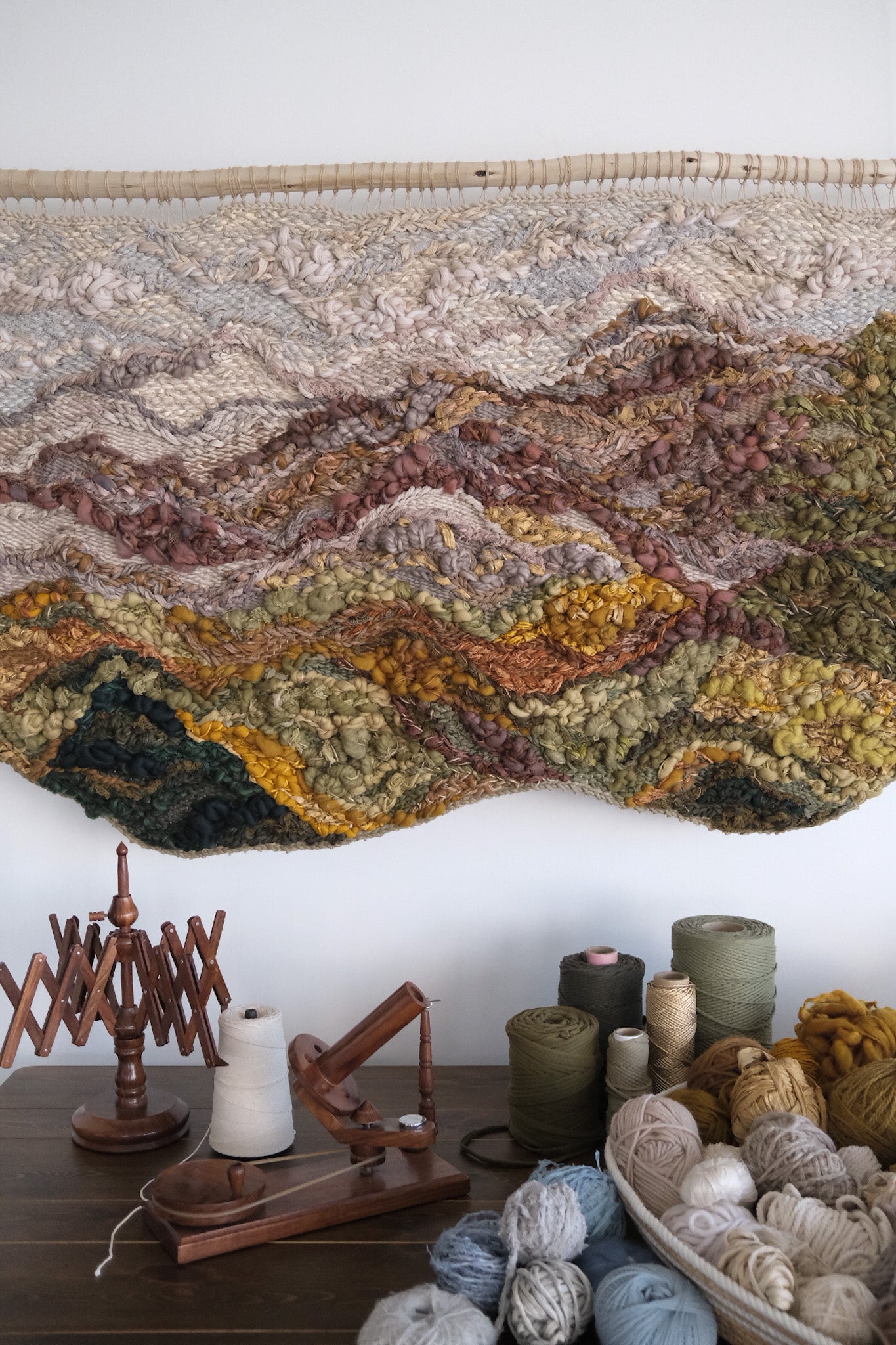 Handwoven textile artwork by Rebecca Whitaker, featuring wool and cotton textures in an intentional tapestry design.