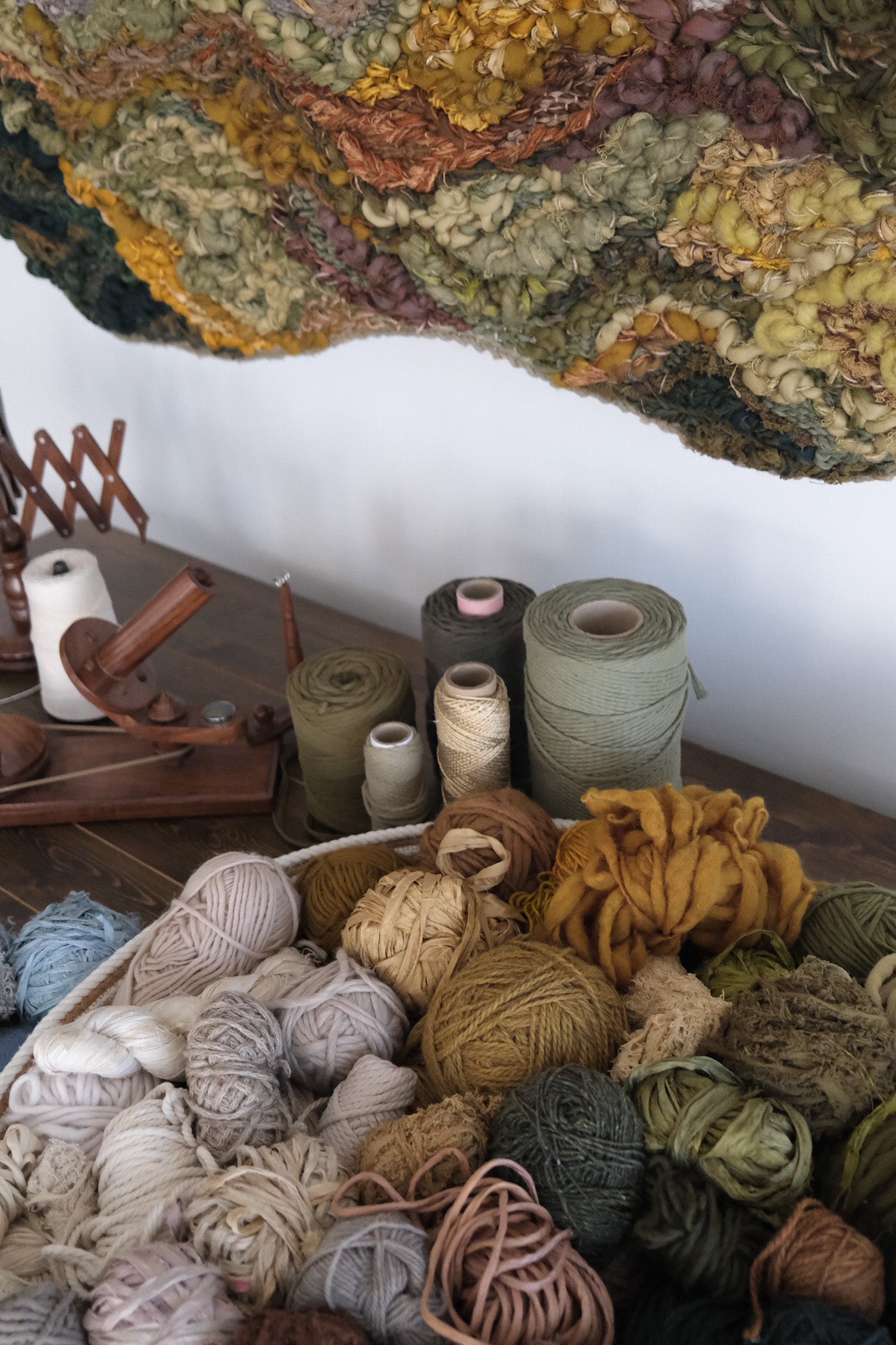 Detail of handwoven fiber art by Rebecca Whitaker, highlighting material variation and craftsmanship.